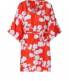 Luxe caftan in fine, pure printed silk - Supremely soft, lightweight material - Chic, red and white floral motif - Deep v-neck and wide, 3/4 sleeves - Gathered, drawstring waist and tie detail at shoulders - Relaxed cut, hits mid-thigh - Perfect for the beach, holidays and leisure - Pair with a bikini, flat sandals or wedges and a raffia tote