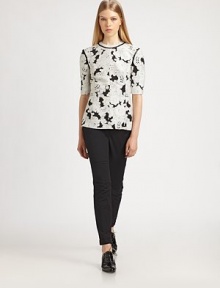 Contrast surge stitching defines the silhouette of this sharp paisley-printed top.CrewneckShort sleevesContrast stitchingConcealed back zip46% wool/42% viscose/9% silk/3% nylonDry cleanImportedModel shown is 5'9½ (176cm) wearing US size 4. Contrast surge stitching defines the silhouette of this sharp paisley-printed top.CrewneckShort sleevesContrast stitchingConcealed back zip46% wool/42% viscose/9% silk/3% nylonDry cleanImportedModel shown is 5'9½ (176cm) wearing US size 4.