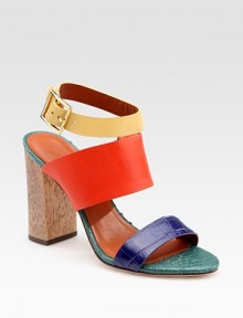 Vibrant leather and croc-print leather straps, elevated by a wide wooden heel. Wooden heel, 4 (100mm) Leather upper Leather lining Buffed leather sole Padded insole Imported Vibrant leather and croc-print leather straps, elevated by a wide wooden heel. Wooden heel, 4 (100mm) Leather upper Leather lining Buffed leather sole Padded insole Imported