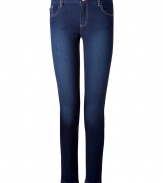Skinny jeans in deep blue stretch cotton with contrasting stitching - Features a traditional design with five-pocket styling and a waistband with belt loops - Slightly faded wash - Flattering fit highlights backside and lengthens the legs - Perfect jeans for work or play - Wear with button down shirt, blazer and heels at the office or with a favorite tee and flats for the weekend