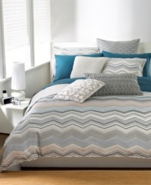 Design in motion! Multicolor zigzag patterns take center stage on this Bar III Bedding Moto duvet cover, giving your bed a modern update. The reverse features a muted pinstripe landscape for a contrasting effect.