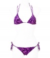 Stylish bikini in fine, synthetic fiber blend - Especially comfortable and flattering, thanks to a generous amount of stretch - Vibrant purple and pink leopard print - Triangular halter top with double straps and adjustable cups ties at back and nape of neck - Decorative criss cross design and gold snake ring - String brief ties at hips, offers modest coverage at rear - Sexy and fun, a must for you next vacation or beach getaway - Wear solo or layer beneath a caftan and pair with wedge sandals