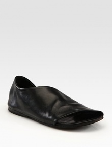 Lavish leather crafted into an asymmetrical upper with leather lining and a padded insole. Leather upperLeather lining and solePadded insoleMade in Italy Lavish leather crafted into an asymmetrical upper with leather lining and a padded insole. Leather upperLeather lining and solePadded insoleMade in Italy