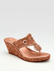 Airy cork features metallic leather details for a hint of glamour.Cork wedge, 2½ (65mm) Platform, ½ (15mm) Compares to a 2 heel (50mm) Leather lining Rubber sole Made in USAOUR FIT MODEL RECOMMENDS ordering true size. Airy cork features metallic leather details for a hint of glamour.Cork wedge, 2½ (65mm) Platform, ½ (15mm) Compares to a 2 heel (50mm) Leather lining Rubber sole Made in USAOUR FIT MODEL RECOMMENDS ordering true size.