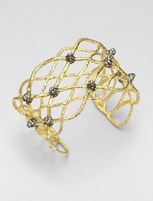 From the Elements Siyabona Collection. A stunning woven net pattern of textured goldtone, dotted with spikey clusters of dazzling Swarovski crystals.CrystalGoldtone and ruthenium platingDiameter, about 2.25 (adjustable)Width, about 1.5Imported From the Elements Siyabona Collection. A stunning woven net pattern of textured goldtone, dotted with spikey clusters of dazzling Swarovski crystals.CrystalGoldtone and ruthenium platingDiameter, about 2.25 (adjustable)Width, about 1.5Imported