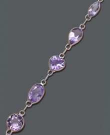 Add a royal touch to your look. Rich amethyst (6 ct. t.w.) in oval and round shapes shine bright against a 14k gold setting. Approximate length: 7 inches. Add a royal touch to your look. Rich amethyst (6 ct. t.w.) in oval and round shapes shine bright against a 14k gold setting. Approximate length: 7 inches.