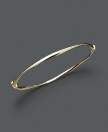 Add a luxurious layer for simple refinement. Bangle features a subtle twist design crafted in 14k gold. Approximate diameter: 2-3/8 inches. Add a luxurious layer for simple refinement. Bangle features a subtle twist design crafted in 14k gold. Approximate diameter: 2-3/8 inches.