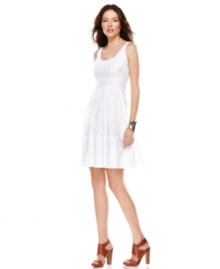 A tonal mixed animal print adds a fierce factor to this otherwise sweet Calvin Klein sundress -- pop it with bright heels!