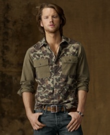 Channeling a spirit of adventure and a hip downtown vibe, this cotton twill shirt goes the rugged route with a retro camo print. Channeling a spirit of adventure and a hip downtown vibe, this cotton twill shirt goes the rugged route with a retro camo print.