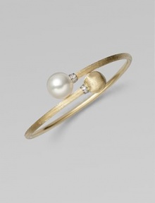 Brushed 18k yellow gold, luminous diamonds, and an iridescent pearl richly combine to create this artistic, elegant design.Diamonds, 0.06 tcw Freshwater pearl 18k yellow gold Diameter, about 2½ Made in Italy Brushed 18k yellow gold, luminous diamonds, and an iridescent pearl richly combine to create this artistic, elegant design.Diamonds, 0.06 tcw Freshwater pearl 18k yellow gold Diameter, about 2½ Made in Italy