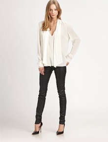 Elegant neck tie and ruched trim update this sophisticated silk blouse. V-neck with self-tieLong sleevesLonger length hits below the hipsSilkDry cleanImportedModel shown is 5'10 (177cm) wearing US size Small. Elegant neck tie and ruched trim update this sophisticated silk blouse. V-neck with self-tieLong sleevesLonger length hits below the hipsSilkDry cleanImportedModel shown is 5'10 (177cm) wearing US size Small.