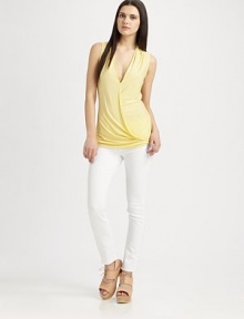 Featherweight jersey draped beautifully from shoulder to hem in a mock-wrap silhouette.V necklineSleevelessMock-wrap frontPullover styleAbout 29 from shoulder to hem94% rayon/6% spandexDry cleanMade in USAModel shown is 5'9 (175cm) wearing US size Small. Featherweight jersey draped beautifully from shoulder to hem in a mock-wrap silhouette.V necklineSleevelessMock-wrap frontPullover styleAbout 29 from shoulder to hem94% rayon/6% spandexDry cleanMade in USAModel shown is 5'9 (175cm) wearing US size Small.