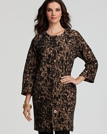 A timeless animal print adorns this chic cardigan with raglan sleeves by Jones New York Collection. Team with black pants for effortless workday style. A timeless animal print adorns this chic cardigan with raglan sleeves by Jones New York Collection. Team with black pants for effortless workday style.