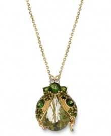 Beetle Beautification! This glamorous winged bug is adorned with green amethyst (9-3/4 ct. t.w.) and green tourmaline (2 ct. t.w.) gemstones, while diamond accents provide extra shine. Set in sterling silver and 14k gold. Approximate length: 18 inches. Approximate drop: 1 inch.