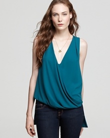 A stylish twist on a classic tank, this soft knit top featuring a feminine draped front for layer-perfect style. A stylish twist on a classic tank, this soft knit top featuring a feminine draped front for layer-perfect style.