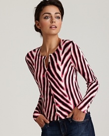 An animal-inspired print creates an exotic look for this luxe DIANE von FURSTENBERG cardigan. The ultimate fall piece, layer it over an LBD for office-chic or wear it solo on weekends with wide-leg jeans. An animal-inspired print creates an exotic look for this luxe DIANE von FURSTENBERG cardigan. The ultimate fall piece, layer it over an LBD for office-chic or wear it solo on weekends with wide-leg jeans.