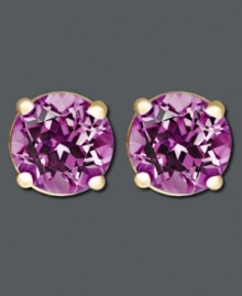 Add eye-popping purple to your wardrobe. Earrings feature pretty round-cut amethysts (3/4 ct. t.w.) in a 14k gold post setting. Approximate diameter: 1/4 inch.