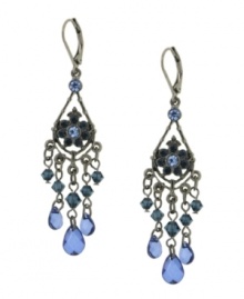 From out of the blue and into your wardrobe. Accentuate any outfit with 2028's chic chandeliers. Earrings highlight multicolored blue crystals suspended from a silver tone mixed metal leverback setting. Approximate drop: 2-3/4 inches. From out of the blue and into your wardrobe. Accentuate any outfit with 2028's chic chandeliers. Earrings highlight multicolored blue crystals suspended from a silver tone mixed metal leverback setting. Approximate drop: 2-3/4 inches.