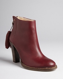 Add a little swing to your look with these not-entirely basic Ted Baker booties; tassels at the back lend interest to your every move. Add a little swing to your look with these not-entirely basic Ted Baker booties; tassels at the back lend interest to your every move.