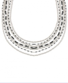 Be a jet-setter. A layered silhouette sets apart this chic multi-chain necklace from 2028. Alluring jet black beads add intrigue. Crafted in silver tone mixed metal. Approximate length: 16 inches + 3-inch extender. Be a jet-setter. A layered silhouette sets apart this chic multi-chain necklace from 2028. Alluring jet black beads add intrigue. Crafted in silver tone mixed metal. Approximate length: 16 inches + 3-inch extender.