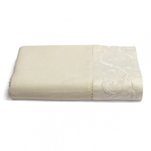 This luxurious all-white bedding ensemble incorporates couture-inspired details - from intricate floral embroidery to elegant silk matelasse - for a feminine vision of modern romance. This luxurious all-white bedding ensemble incorporates couture-inspired details - from intricate floral embroidery to elegant silk matelasse - for a feminine vision of modern romance.