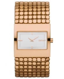 A polished and highly detailed timpiece from the always classy DKNY. Watch crafted of rose-gold tone stainless steel bracelet and rectangular case. White dial features rose-gold tone two hands, stick indices at six, nine and twelve o'clock and logo at three o'clock. Quartz movement. Water resistant to 30 meters. Two-year warranty. A polished and highly detailed timpiece from the always classy DKNY. Watch crafted of rose-gold tone stainless steel bracelet and rectangular case. White dial features rose-gold tone two hands, stick indices at six, nine and twelve o'clock and logo at three o'clock. Quartz movement. Water resistant to 30 meters. Two-year warranty.