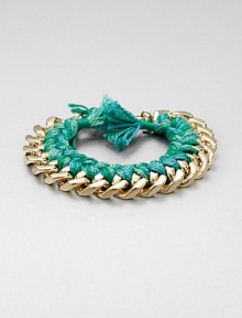 A colorful design featuring a goldtone chain accented with variegated yarn. Cotton yarnGoldtoneLength, about 7.16Lobster clasp closureImported A colorful design featuring a goldtone chain accented with variegated yarn. Cotton yarnGoldtoneLength, about 7.16Lobster clasp closureImported