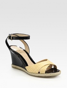 Textured straw upper with a slight espadrille platform, patent leather wedge and an adjustable slingback strap. Self-covered wedge, 3 (75mm)Straw and patent leather upperLeather liningRubber solePadded insoleMade in ItalyOUR FIT MODEL RECOMMENDS ordering one half size up as this style runs small. Textured straw upper with a slight espadrille platform, patent leather wedge and an adjustable slingback strap. Self-covered wedge, 3 (75mm)Straw and patent leather upperLeather liningRubber solePadded insoleMade in ItalyOUR FIT MODEL RECOMMENDS ordering one half size up as this style runs small.