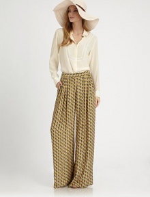 Tailored to fit like your favorite borrowed button-down, this menswear-inspired style is updated in sumptuously-soft silk.Point collarMesh inset bibButton-down placketUneven hemlineAbout 28 from shoulder to hemSilkDry cleanImportedModel shown is 5'10 (178cm) wearing US size Small. Tailored to fit like your favorite borrowed button-down, this menswear-inspired style is updated in sumptuously-soft silk.Point collarMesh inset bibButton-down placketUneven hemlineAbout 28 from shoulder to hemSilkDry cleanImportedModel shown is 5'10 (178cm) wearing US size Small.
