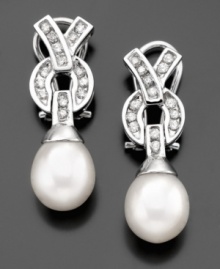 Superior beauty with a lovely design; these gorgeous earrings will always be with you. Featuring cultured freshwater pearls (9mm) and round-cut diamonds (3/8 ct. t.w.) set in 14k white gold. Approximate drop: 1 inch. Superior beauty with a lovely design; these gorgeous earrings will always be with you. Featuring cultured freshwater pearls (9mm) and round-cut diamonds (3/8 ct. t.w.) set in 14k white gold. Approximate drop: 1 inch.