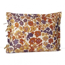 Dress your bed with a signature DIANE von FURSTENBERG bold floral print in shades of gold, orange and purple. Dress your bed with a signature DIANE von FURSTENBERG bold floral print in shades of gold, orange and purple.