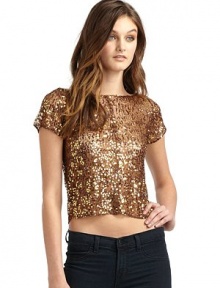 THE LOOKJewel necklineShort sleevesAllover sequinsBack zipTHE FITAbout 18 from shoulder to hemTHE MATERIALPolyesterCARE & ORIGINHand washImported THE LOOKJewel necklineShort sleevesAllover sequinsBack zipTHE FITAbout 18 from shoulder to hemTHE MATERIALPolyesterCARE & ORIGINHand washImported