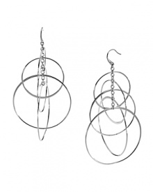 Eye-catching glamor is a hallmark of the MICHAEL Michael Kors brand. Make the look yours with this pair of striking orbital hoop earrings in silver plated metal. Eye-catching glamor is a hallmark of the MICHAEL Michael Kors brand. Make the look yours with this pair of striking orbital hoop earrings in silver plated metal.