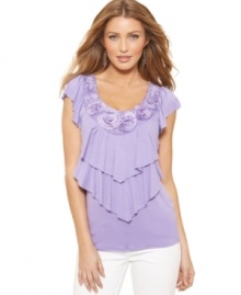 Swingy tiers of fabric and a row of fabric rosettes makes AGB's top feel feminine and just right for spring! Swingy tiers of fabric and a row of fabric rosettes makes AGB's top feel feminine and just right for spring!