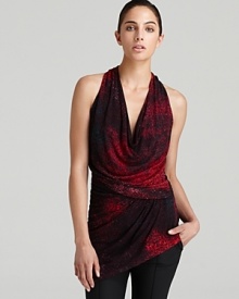 Make the fashion cut in an decadently ruched Halston Heritage top emboldened by rich bursts of color. Showcase the asymmetric hem against sleek leather leggings for real modern edge. Make the fashion cut in an decadently ruched Halston Heritage top emboldened by rich bursts of color. Showcase the asymmetric hem against sleek leather leggings for real modern edge.