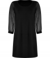 Take a feminine stance on the Little Black Dress with DKNYs sheer-sleeve shift, the perfect fusion of sophistication and seduction - Rounded neckline, sheer 3/4 sleeves, buttoned cuffs, fitted - Play with proportions and pair with sky-high heels