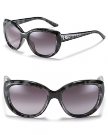 Look fierce in panther print oversized cat eye sunglasses from Dior. Look fierce in panther print oversized cat eye sunglasses from Dior.