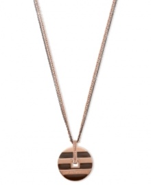 A rosy pendant with subtle sparkle. Emporio Armani's stainless steel pendant features a rose-gold and brown ion-plated circular design with a vertical bar crystallized with light peach Swarovski elements. Accented with a dark brown lacquer and satin finish. Crafted in stainless steel. Approximate length: 17 inches + 2-inch extender. Approximate drop: 1-3/4 inches. A rosy pendant with subtle sparkle. Emporio Armani's stainless steel pendant features a rose-gold and brown ion-plated circular design with a vertical bar crystallized with light peach Swarovski elements. Accented with a dark brown lacquer and satin finish. Crafted in stainless steel. Approximate length: 17 inches + 2-inch extender. Approximate drop: 1-3/4 inches.
