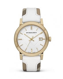 This Burberry watch makes an unforgettable impression. Crafted of gold-plated stainless steel with a bold, checked band, it models distinctive, designer style.