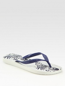 This tropical favorite has a thong front and uniquely printed footbed. Rubber upperPadded insoleRubber soleImported This tropical favorite has a thong front and uniquely printed footbed. Rubber upperPadded insoleRubber soleImported