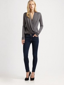 Stand out in the crowd with this elegantly draped jersey top, defined by a crossover v-neck that creates a wrap-like effect. Crossover v-neckLong sleevesElasticized hemModalDry cleanMade in USAModel shown is 5'11 (180cm) wearing US size Small. Stand out in the crowd with this elegantly draped jersey top, defined by a crossover v-neck that creates a wrap-like effect. Crossover v-neckLong sleevesElasticized hemModalDry cleanMade in USAModel shown is 5'11 (180cm) wearing US size Small.