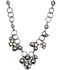 Luxe links. AK Anne Klein's chain link necklace makes a striking statement. With lustrous acrylic pearls in a gorgeous shade of gray as well as glittering glass accents, it's crafted in hematite tone mixed metal. Approximate length: 16 inches. Luxe links. AK Anne Klein's chain link necklace makes a striking statement. With lustrous acrylic pearls in a gorgeous shade of gray as well as glittering glass accents, it's crafted in hematite tone mixed metal. Approximate length: 16 inches.