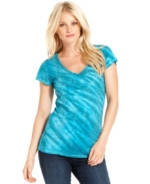 Chic beading and an abstract animal print adorns Calvin Klein Jeans' pretty tee for a basic look with bite! Chic beading and an abstract animal print adorns Calvin Klein Jeans' pretty tee for a basic look with bite!
