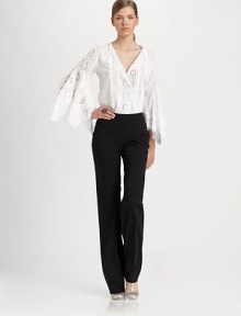 This airy, lace-trimmed design has a distinctly bohemian sensibility.Jewel necklineThree-quarter sleeves with handkerchief cuffsConcealed front closureLace trimCottonDry cleanMade in USA of imported fabricModel shown is 5'11 (180cm) wearing US size 4. This airy, lace-trimmed design has a distinctly bohemian sensibility.Jewel necklineThree-quarter sleeves with handkerchief cuffsConcealed front closureLace trimCottonDry cleanMade in USA of imported fabricModel shown is 5'11 (180cm) wearing US size 4.