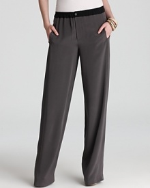 Cut in sumptuous silk, these black Vince pants feature a smart navy trim for a sophisticated turn at office style. Complement the detail with a tailored blouse and glossy pumps and call on clients with the utmost confidence. Cut in sumptuous silk, these black Vince pants feature a smart navy trim for a sophisticated turn at office style. Complement the detail with a tailored blouse and glossy pumps and call on clients with the utmost confidence.