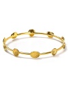 Perfect for stacking, Melinda Maria's solid bangle gives wrists a golden touch. Show your cuff love and wear this simple style with an eclectic armful.