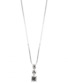 The sophistication of sparkle. A trio of round-cut glass accents are strung lovingly from a silver tone chain on this Anne Klein necklace. Crafted in silver tone mixed metal. Approximate length: 16 inches + 2-inch extender. Approximate drop: 1 inch. The sophistication of sparkle. A trio of round-cut glass accents are strung lovingly from a silver tone chain on this Anne Klein necklace. Crafted in silver tone mixed metal. Approximate length: 16 inches + 2-inch extender. Approximate drop: 1 inch.