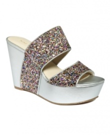 Stunning straps. Nine West's Larysa platform wedge sandals slide on comfortably and are super stylish too. Stunning straps. Nine West's Larysa platform wedge sandals slide on comfortably and are super stylish too.