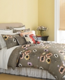 Wake up to a garden in bloom with Martha Stewart Collection's Pastel Poppies comforter set. Bright watercolor blossoms accent carefree floral sketches and stencils for a look that appeals to your artistic sensibility. The comforter reverses to a stencil print. Wake up to a garden in bloom with Martha Stewart Collection's Pastel Poppies comforter set. Bright watercolor blossoms accent carefree floral sketches and stencils for a look that appeals to your artistic sensibility. The comforter reverses to a stencil print.