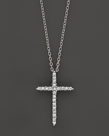 An elegant diamond cross in 18K. white gold. By Roberto Coin. An elegant diamond cross in 18K. white gold. By Roberto Coin.